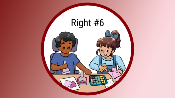 two young people doing crafts together at a table; one is using an AAC device to say something
